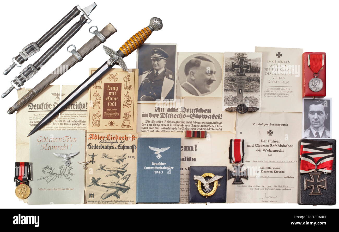 Dr. Horst Patuschka - a Knight`s Cross grouping of a night fighter pilot. The Knight's Cross is the first model of maker Klein & Quenzer, silver frame with '800' fineness mark, blackened iron core, silver suspension ring (likewise punched '800'). Weight 31.1 g. Included is the original award presentation case and a 73 cm length of ribbon. Also, the preliminary possession document for the Knight's Cross (tr) 'awarded on 10 May 1943' with original signature of Generaloberst Loerzer (folded and double-holed), a Double Badge for Pilot and Observer, non-ferrous metal with gilt w, Editorial-Use-Only Stock Photo
